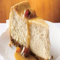 Hot Buttered Rum Cheesecake with Brown Sugar-Rum Sauce image