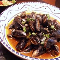 Stir-Fried Mussels With Chili, Garlic and Basil image