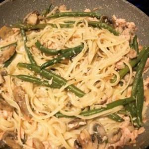 Salmon linguine with greens and butter mushrooms image