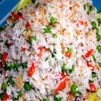 Coconut Rice Erupting With Spices, Nuts & Peas_image