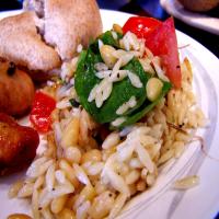 Elegant Orzo With Wilted Spinach, Feta and Pine Nuts image