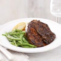 Lamb steaks with crispy potatoes & minted beans image