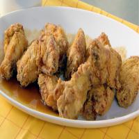 Emeril's Kicked-Up Chicken Wings with Spiced Apple & Bourbon Glaze image