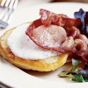 Ricotta hot cakes with crispy bacon & mixed leaves image