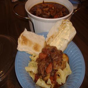 Oxtail Stew over Buttered Noodles image