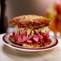 Latke Corned Beef Sandwich with Apple and Sour Cream Slaw image