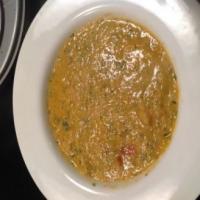 Marrow, watercress, lentil and tomato soup image