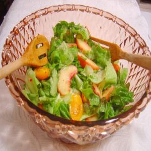Garden Greens With Yellow Tomatoes and Peaches_image