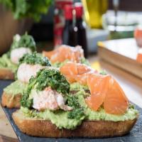 Spiced Avocado Toast with Citrus-Cured Salmon and Poached Egg image