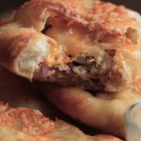 Chicken Bacon Ranch Mini Calzones Recipe by Tasty image