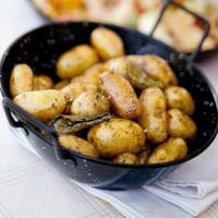 Garlicky fondant potatoes image