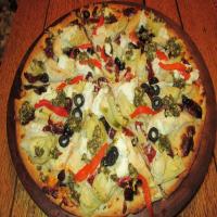Artichoke, Pesto & Sun-Dried Tomato Pizza With Three Cheeses_image