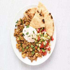 Ful Medames with Eggs and Pita image
