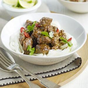 Lemongrass beef stew with noodles image