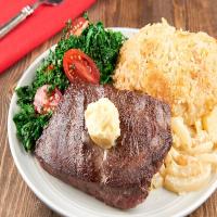 Flat Iron Steak with Roasted Garlic Butter With Fennel Gratin and Sauteed Kale_image