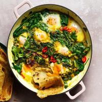 Spinach, coconut & turmeric baked eggs with paratha image