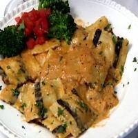 Black and White Lobster Ravioli in a Seafood Cream Sauce_image