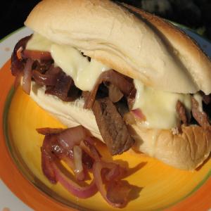 Philly Cheesesteaks With Melted Fontina and Sauteed Red Onions_image