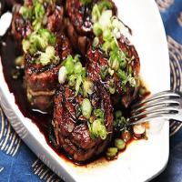 Grilled Stuffed Flank Steak With Scallions, Ginger, and Teriyaki Glaze Recipe_image