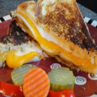Four Grilled Cheese Sandwich With Onions_image