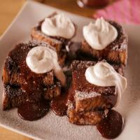 Stuffed Mexican Hot Chocolate French Toast with Cinnamon Whipped Cream and Chocolate-Maple Ganache image