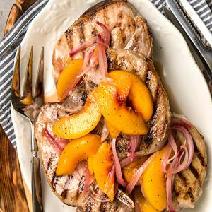 Grilled Rib Pork Chops with Sweet and Tangy Peach Relish Recipe | Epicurious.com_image