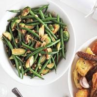 Stir-fried sprouts with green beans, lemon & pine nuts image