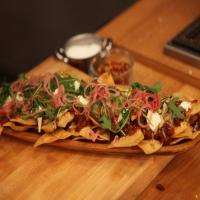 Sweet and Spicy Sausage Ragu Nachos with Pickled Onions image