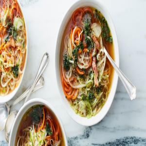 Root Vegetable Zoodle Soup with Bacon and Basil Oil image