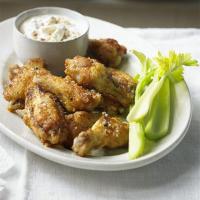 Buffalo wings with blue cheese dip image