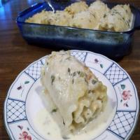 Chicken and Cheese Rotolo With Many Cloves Garlic Sauce image
