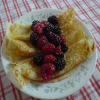 Swedish Pancakes With Berry-Cardamom Topping image