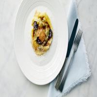 Raviolo with Egg Yolk Truffle Butter image