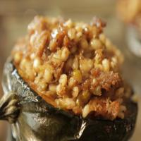 Stuffed Acorn Squash with Sausage, Barley and Goat Cheese image