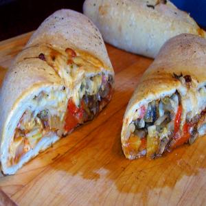 Stromboli With Prosciutto, Peppers, Onions, Garlic & Shrooms_image