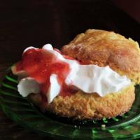 Traditional English Tea Time Scones With Jam and Cream image