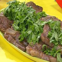 T-Bone Steaks with Chopped Green Garni, Broiled Tomatoes with Cheese, Olives and Herbs_image