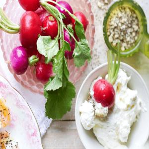 Radishes with whipped goat's butter & celery salt image