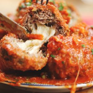 Easy Slow - Cooker Mozzarella-Stuffed Meatballs And Sauce Recipe by Tasty_image