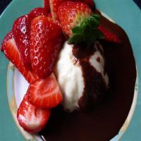 Panna Cotta With Strawberries and Chocolate - Orange Sauce image
