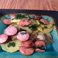 Kielbasa with fried potatoes and onions_image