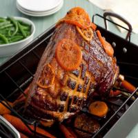 Tangerine-Glazed Easter Ham With Baby Carrots image