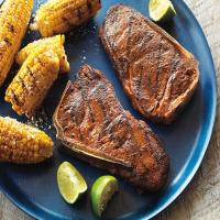 Smoky Strip Steaks with Mexican-Style Grilled Corn image
