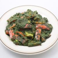 Indian Cheese and Red Peppers in Fragrant Spinach Sauce_image