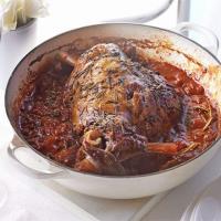Herby baked lamb in tomato sauce image
