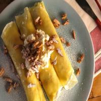Meyer Lemon Ricotta Crepes with Candied Almonds image