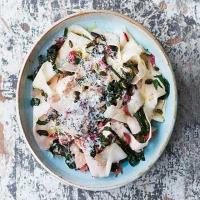 Celeriac ribbons tossed with chard, garlic & pumpkin seeds image