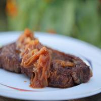 Spice-Rubbed Strip Steaks with Sweet-and-Spicy Onion Sauce_image