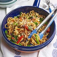 Noodle stir-fry with crunchy peanuts image