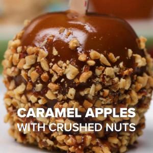 Caramel Apples With Crushed Nuts Recipe by Tasty_image
